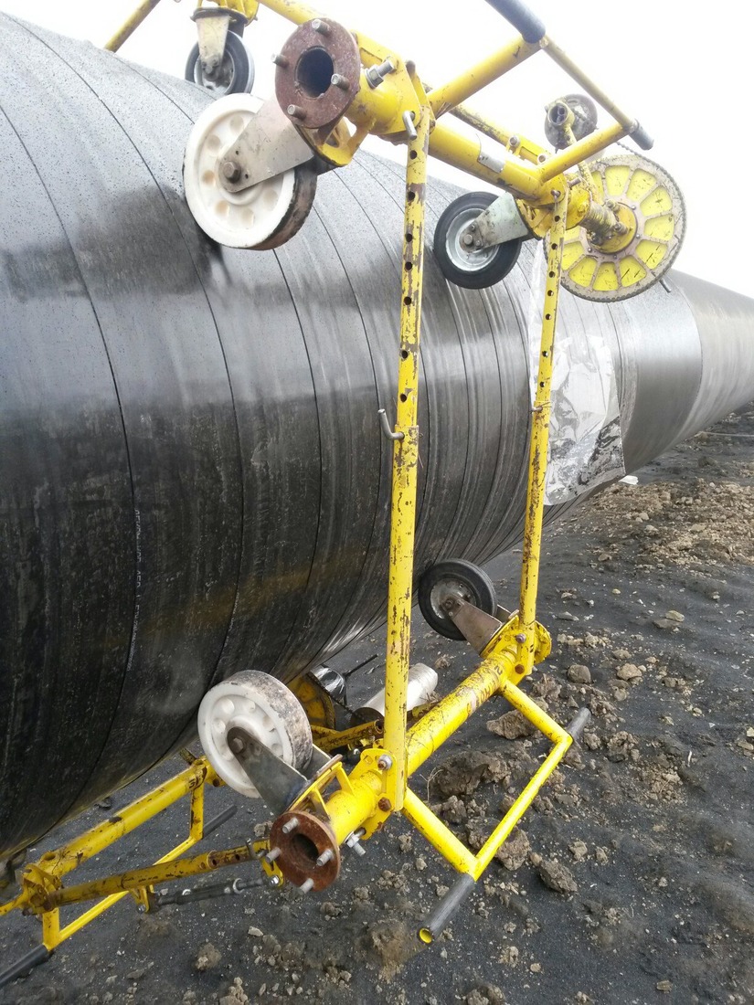 Установка "беличье колесо" для ручного нанесения изоляционного покрытия в трассовых условиях